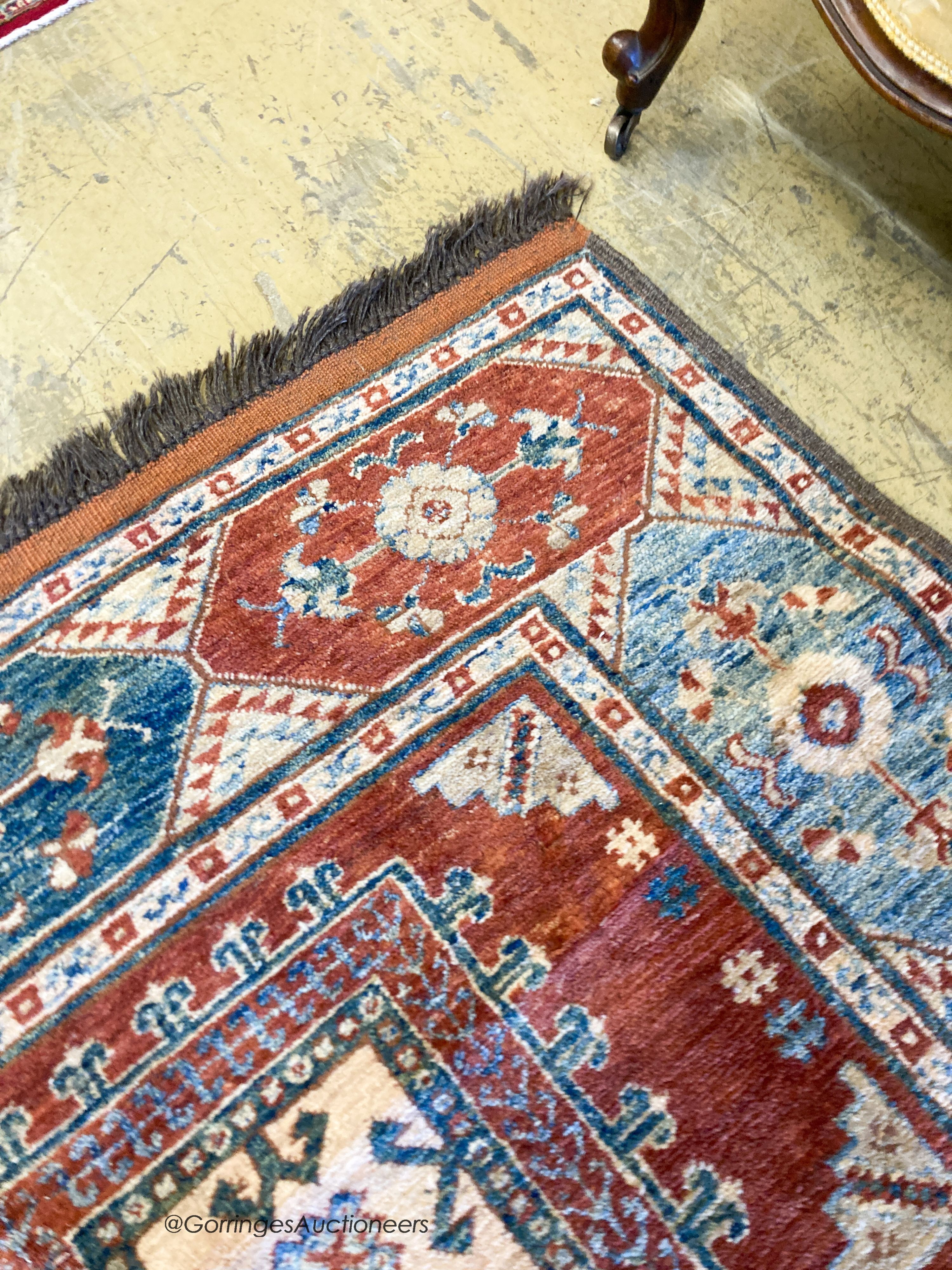 A Caucasian design carpet, 240 x 170cm